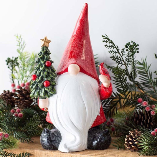 Wind and Weather White-Bearded Gnome in Red Santa Suit with Christmas Tree and Cardinal